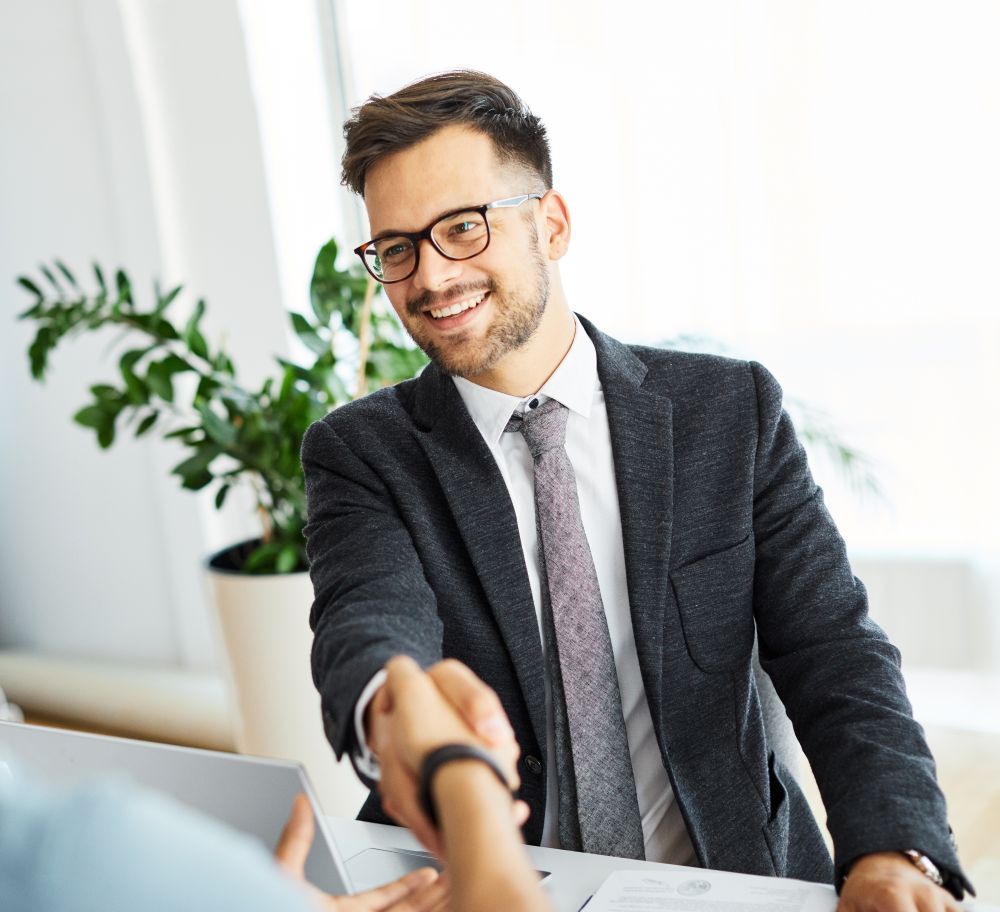 A professional videographer filming a live legal seminar, representing CE21’s expert webcasting production services and rock-solid live streaming infrastructure for education directors